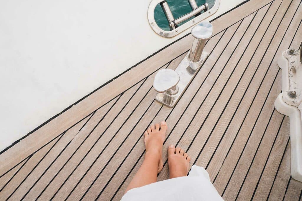 woman standing on the deck of the yacht EPN364M